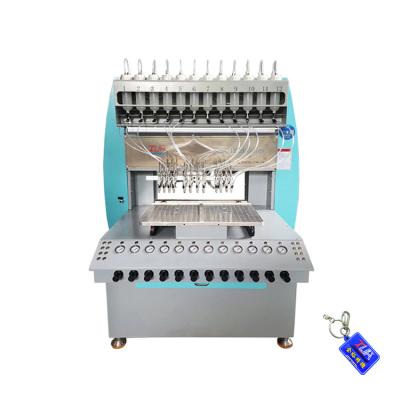 China To Fill Best Selling Rubber Logo Making Machine To Make Custom Logo Key Chain for sale