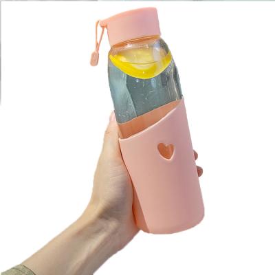 China Sustainable New Heat Resistant Silicone Drinking Water Bottles Glass With Custom Logo for sale