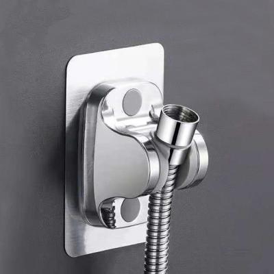 China Without Needles Strong Adhesive Wall Mounted Plastic Bracket Adjustable Hand Shower Head Holder Shower Accessories for sale