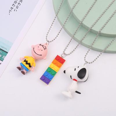 China Handsome Cartoon Decoration Charlie Key Chain Doll Soft Rubber Car Bag Pendant Gift Legos for sale