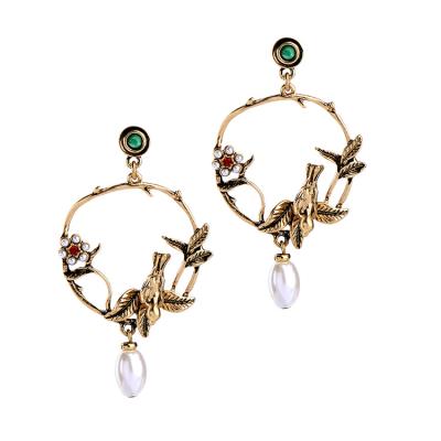 China FASHIONABLE wholesale crystal three-dimensional bird earrings vintage and elegant pearl flowers drop earrings stud earring for sale