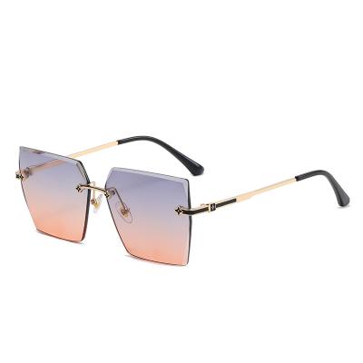 China 2022 New Style Fashion Sunglasses Frameless Cut Edge Frame UV Protection Increasing Real Glass Gold Hard Sunglasses Carbon Fiber Sunglasses for sale