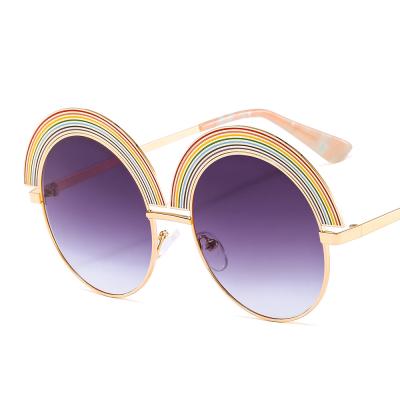 China Luxury Rose Gold Eyewear Wrapping Rainbow Sunglasses 90s Fashion New Metal Frameless Sunglasses Women Trend Fashion Sunglasses for sale