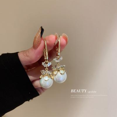 China Vintage 925 Silver Flower Pearl Circle Earrings With Charm Fashion Pearl Drop Dangle Earrings For Women for sale