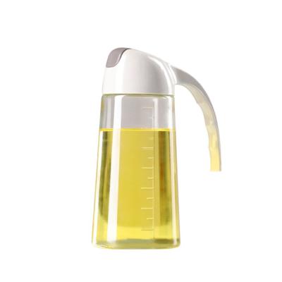 China Freshness Preservation Kitchen Glass Cooking Olive Oil Bottles 600ml Storage Bottles Sauce Vinegar Oil Dispenser With Cover for sale