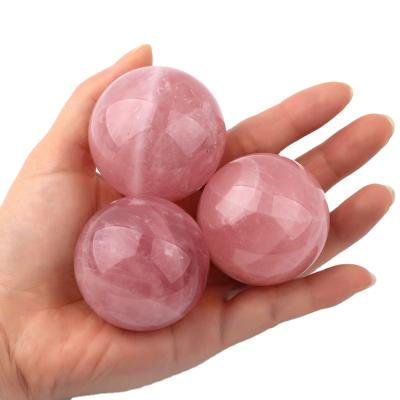 China Wholesale Custom Natural Crystal Rose Quartz Crystal Ball 40mm Mini Sphere Crystal For Home Furnishing From Europe Powder Ball for sale