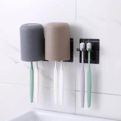 China Sustainable Household Plastic Single Wall Mounted Toothbrush Holder Wash Cup for sale