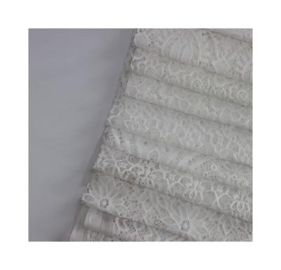 China Cheap high quality 100% milk silk polyester guipure lace fabric water soluble Shrink-resistant for sale