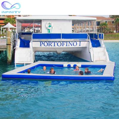 China 0.9mm PVC TARP Customized Ocean Sea Yacht Portable Inflatable Floating Inflatable Swimming Pool With Netting Enclosure for sale