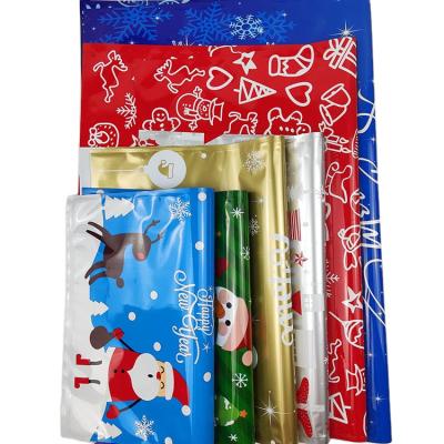 China Disposable Reusable Plastic Drawstring Christmas Gift Bags for sale