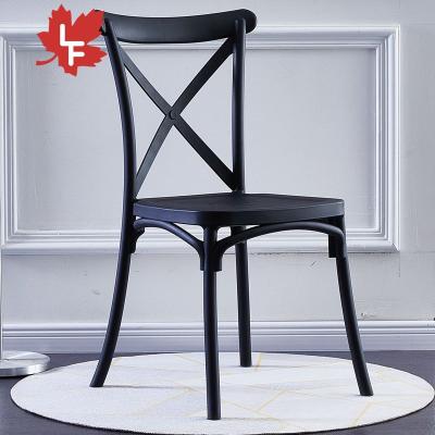 China Professional production plastic cross back chair pp plastic dining chair stackable plastic chair for wedding for sale