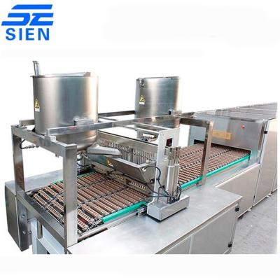 China Full Automatic Chocolate Enrobing Bar (Snicker) Production Line With Conveyor for sale