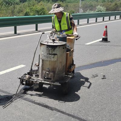 Cina Granuli di patch stradale di asfalto fuso per livellamento di approcci al ponte in vendita