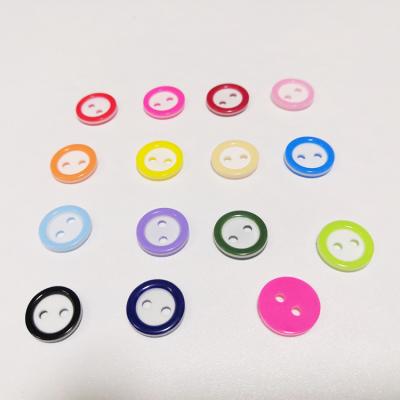 China Cheap Price 11mm Dry Cleaning Two Hole Round Colorful Polyester Buttons For Kids Clothes for sale