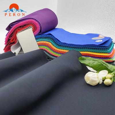 China Black Waterproof Stretch Rayon Yarn Dyed 65% 35% Nylon Spandex Fabric For Swimwear for sale