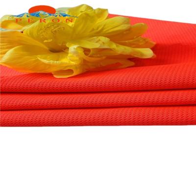 China Wholesale Custom Stretch Machine Made Orange Polyester Stretch Fabric For Sports for sale