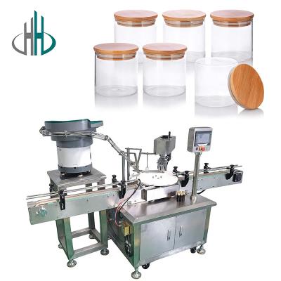 China HC Full-automatic Glass Jars Bottle Capping Machine For Filling Labeling jar Covers machine for sale