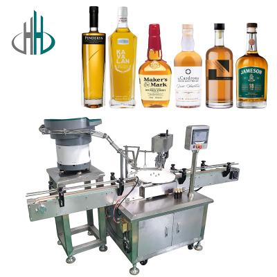 China Glass Or Plastic Bottle Whiskey Vodka Filling plastic bottle capping machine for sale