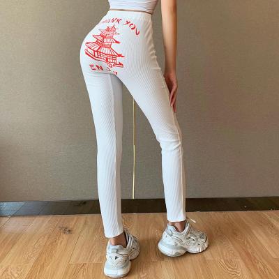 China 2021 Best Crane Tower Print Women's Track Breathable Pants Casual High Waist Sale Yellow Tight Girls Pants for sale