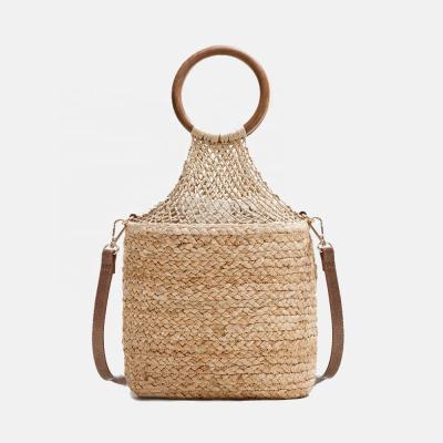 China Round Wooden Straw Plant Weave Braid Fashion Bucket Handle Lady Fashion Beach Bag for sale