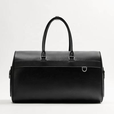 China Fashion black premium men carry on luggage duffel hand pebble grainy genuineleather travel rolling bag for sale