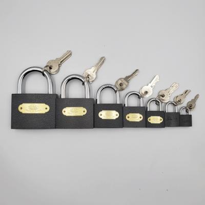 China Heavy duty iron 63mm pujiang gray color painted iron padlock with brass cylinder for sale