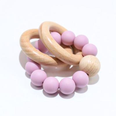 China Wooden Ring Silicone Beads Baby Teething Bracelets Toys Gift Baby Silicone Teether Nursing Bracelet Soft Beech for sale