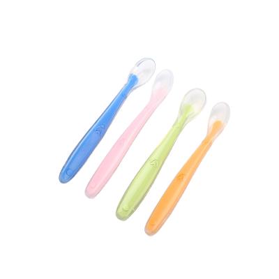 China 0 to 6 months silicone baby spoon food grade non-toxic soft blue baby utensils simple silicone spoon for sale