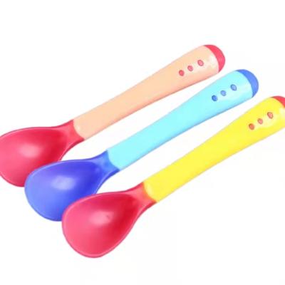 China Environmentally Friendly BPA Free, Temperature-Sensitive, Color-Variable Baby Silicone Feeding Training Spoon and Fork for sale