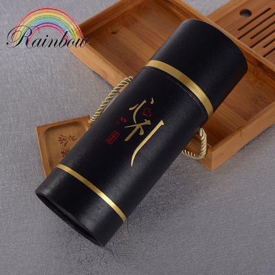 China Recycled Materials Food Grade Paper Tube Black White Cylinder Paper Box With Rope Handle For Tea Gift Packaging for sale