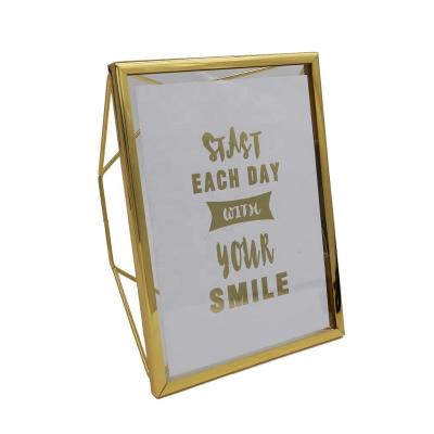 China Newest Home Decoration Metal Home Picture Frame Iron Photo Frame Mounted Gold Table Portrait Photo Frame for sale