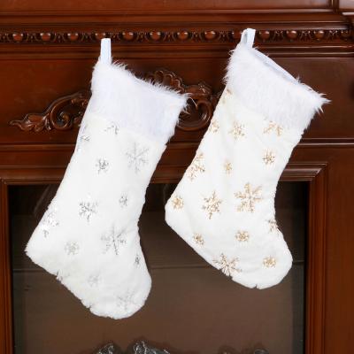 China New Fashionable White Plush Pearl Snowflake Gift Socks Embroidery White Christmas Stocking Bag for sale