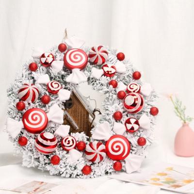 China New 40cm PVC+flocking candy garland on various indoor and outdoor door stage decoration Christmas wreaths for sale