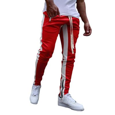 China Anti-wrinkle Men's Drawstring Casual Pants Striped Color Matching Sports Fitness Running Training Pants Plus Size Casual Pants for sale