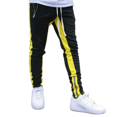 China Anti-Wrinkle Men's Side Stripe Jogger Pants Color Matching Wear-Resistant Sweat-absorbent Casual Jogging Drawstring Waist Sweatpants for sale