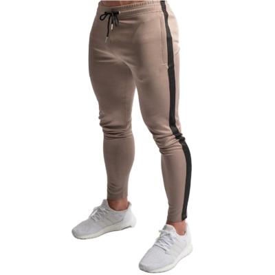 China Hot Selling Anti-wrinkle Men's Sports Pants Custom Made Pure Cotton Sports And Leisure Travel Pants With Small Feet And Fold Over Pants for sale