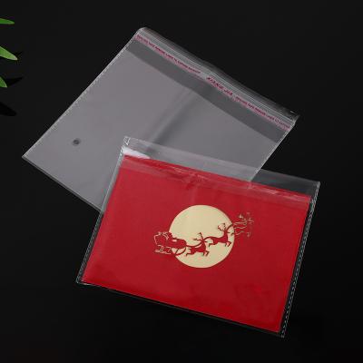 China Wholesale Customizable Moisture-proof Logo Clothing Card Book Opp Bag Plastic Transparent Goods Packaging Self-adhesive Bag for sale