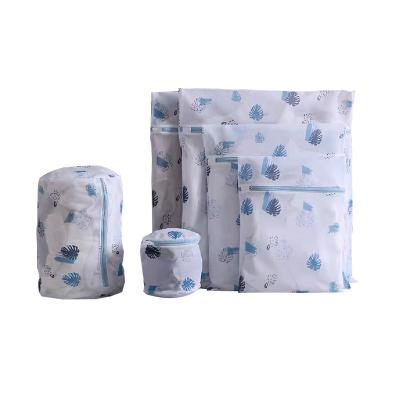 China Modern Orchid Leaves Printed 6 Piece Household Wash Bag Hotel Laundry Bag Set for sale