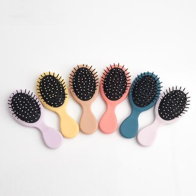 China Exhale Portable Vegan Mini Detangling Portable Logo Baby Hair Brush Dry and Wet Comb for sale