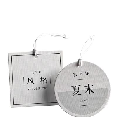 China Sustainable High Quality Custom Unique Logo Clothing Tags Eco Paper Garment Tag for sale