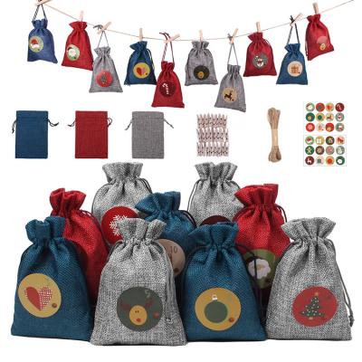 China Mini Christmas Gift Bags High Quality Eco-friendly Cute Cartoon Drawstring Red Canvas Gift Bags For Christmas for sale