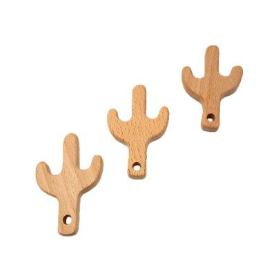 China Safe New Arrival Natural Beech Wood Teether Organic Cactus Shaped Wooden Baby Teether for sale