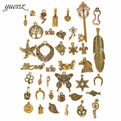 China Vintage 39pcs/bag Gold Mixed Styles Factory Antique Animal Snowflake Charm Pendants DIY Jewelry For Necklace Bracelet Craft Findings U041 for sale