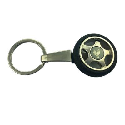 China Fashion Designer Car Parts Tire Vehicle Tire Rotating Metal Cool Key Ring Keychain Fashion Key Chain for sale