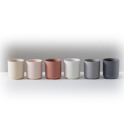 China Nordic Custom Creative Round Matte Ceramic Candle Cup With Manual Ceramic Cover Set Aromatherapy Candle Jar for sale