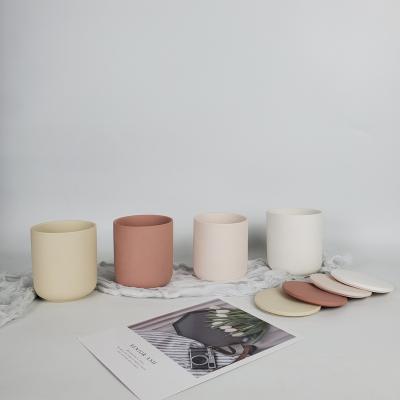 China Nordic wholesale luxury matte color empty clay candle container ceramic jar for candle making for sale