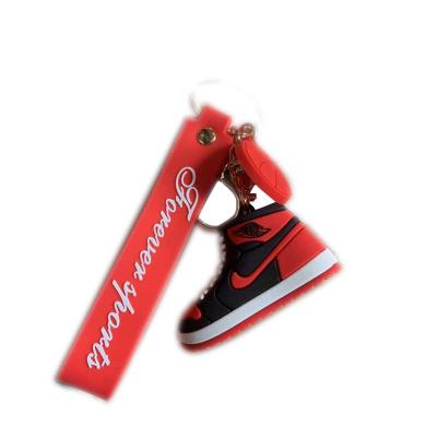 China Unisex Creative Cartoon Soft Rubber Shoes Key Bag Fashion Chain Sneaker Pendant for sale