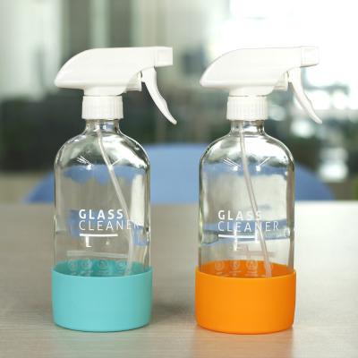 China Custom Personal Care Refillable 16oz 500ml Trigger Round Boston Piece Glass Spray Bottle With Silicone Sleeve For Hair for sale