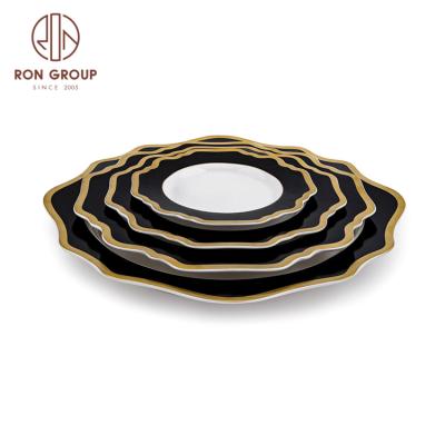 China Viable Factory Price Custom Luxury Banquet Serving Irregular Black Ceramic Dish Dinnerware for sale