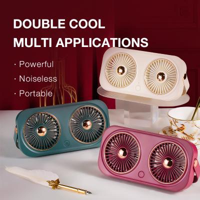 China USB Battery Rechargeable Folding Fan Double Blade Portable Dual Motor Foldable Fan Table Fan for sale